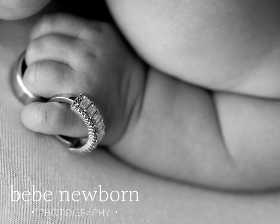 baby with wedding ring